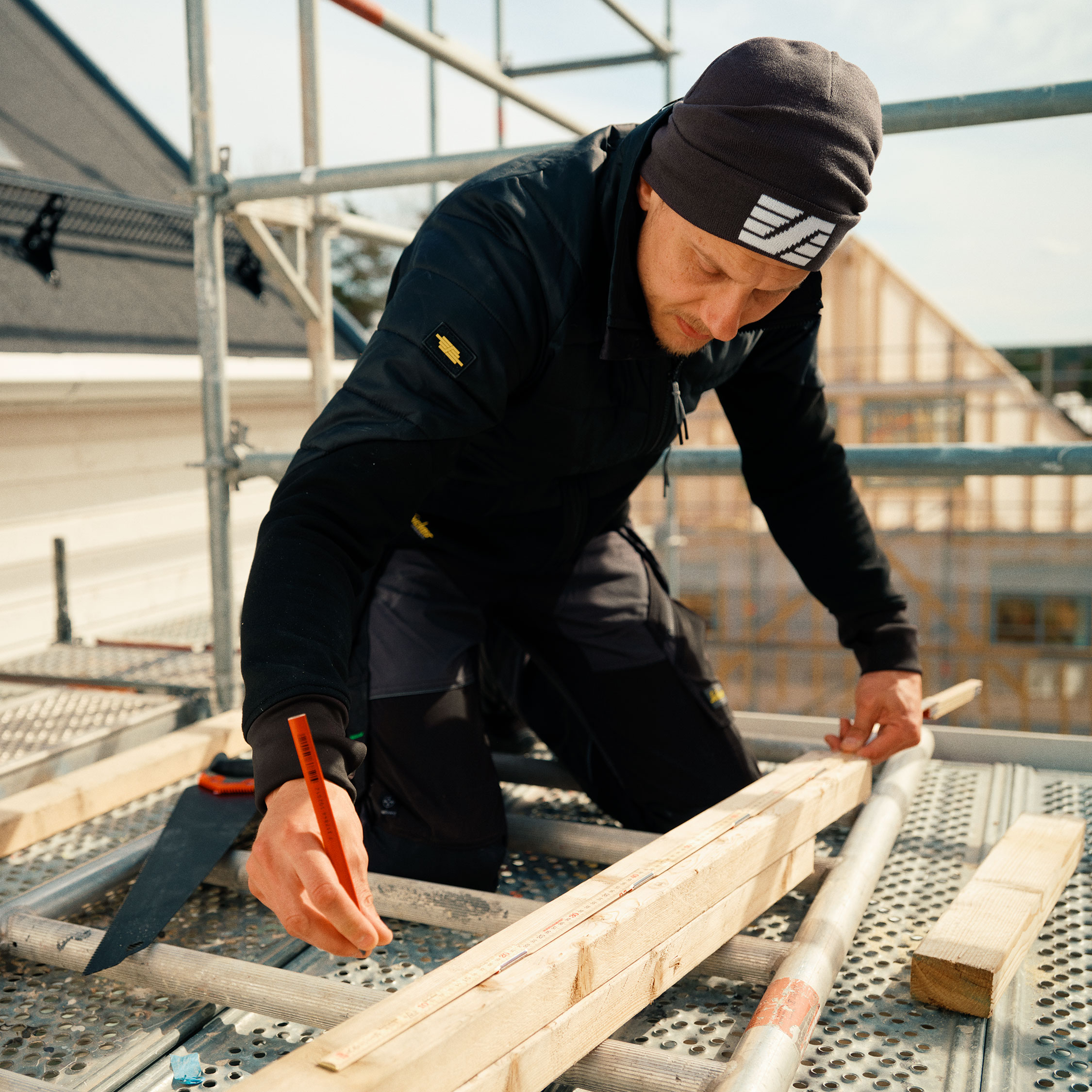 Snickers lue med S logo