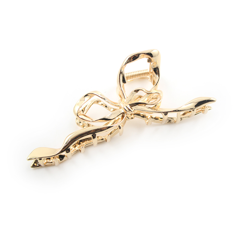 Conmé Hårklemme Bow Guld 3