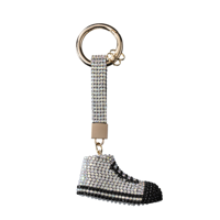 Conmé Bag charm glitter sko Sølv 1